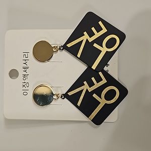 Elegant black ear drop earring.